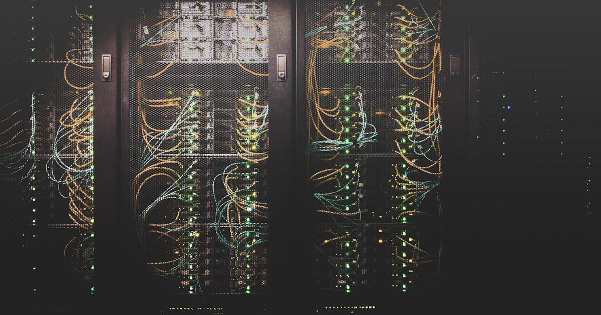 Data centre server racks with blue lighting representing edge computing infrastructure